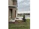 Street view of a newly constructed home with fresh landscaping in the front yard at 2755 Gentle Rain Dr, Davenport, FL 33837