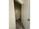 Half-bathroom with tiled floor and commode at 2755 Gentle Rain Dr, Davenport, FL 33837