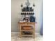 Stylish coffee bar setup with wooden cart and coffee-themed decor at 2917 Kokomo Loop, Haines City, FL 33844