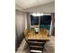 Bright dining area with stylish table and view to the pool at 2917 Kokomo Loop, Haines City, FL 33844