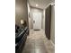 Entryway leading to living room with tile flooring and neutral wall color at 2917 Kokomo Loop, Haines City, FL 33844