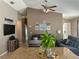 Comfortable living room with nautical decor, adjacent to granite countertop kitchen island at 2917 Kokomo Loop, Haines City, FL 33844