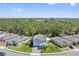 Aerial view of a well-manicured property, situated in a lush, green, and private neighborhood at 3010 Camden Way, Davenport, FL 33837
