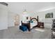 Spacious Primary bedroom with large windows and neutral carpet at 3010 Camden Way, Davenport, FL 33837