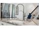 Modern kitchen with stainless appliances and granite countertops, open concept at 3010 Camden Way, Davenport, FL 33837