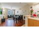 Open-concept living and dining area with modern decor and wood floors, perfect for entertaining at 4002 San Gallo Dr # 106, Kissimmee, FL 34741