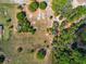 Aerial view of undeveloped land with a few trees and vegetation at 41636 Outlaw Ln, Weirsdale, FL 32195