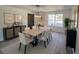 Elegant dining room with stylish furnishings, a modern light fixture, and beautiful decor at 41636 Outlaw Ln, Weirsdale, FL 32195