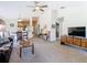 Bright and airy living room seamlessly connects to the dining area, kitchen, and more at 439 Madera Pass, Poinciana, FL 34759