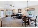 Spacious living room with dining area, comfortable seating, and ample natural light at 439 Madera Pass, Poinciana, FL 34759