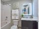 Well-designed bathroom with a shower-tub combo, sleek vanity, and modern finishes for everyday comfort at 4417 Le Reve Ct, Kissimmee, FL 34746