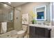 Well-appointed bathroom with a glass-enclosed shower, modern vanity, and contemporary design elements for a luxurious feel at 4417 Le Reve Ct, Kissimmee, FL 34746