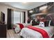 Themed bedroom with two beds, unique wall art, and coordinated decor, perfect for or guests at 4417 Le Reve Ct, Kissimmee, FL 34746