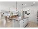 Open-concept kitchen flowing into the dining and living areas, perfect for modern living at 4677 Glencrest Loop, St Cloud, FL 34772