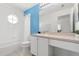 Upstairs bathroom featuring a tub shower and white vanity at 4692 Sw Golden Beach N Ct, Kissimmee, FL 34746