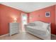 Cozy bedroom featuring a daybed, and light-colored floors at 4692 Sw Golden Beach N Ct, Kissimmee, FL 34746