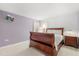 Primary bedroom with wood furniture and great natural light at 4692 Sw Golden Beach N Ct, Kissimmee, FL 34746
