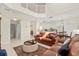 Bright living area with an open layout connecting to the kitchen and dining area upstairs at 4692 Sw Golden Beach N Ct, Kissimmee, FL 34746