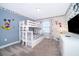 Themed ' bedroom with bunk beds, and fun decor at 4835 Lullaby Ln, Kissimmee, FL 34746