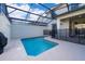 Private backyard pool area with screen enclosure at 4835 Lullaby Ln, Kissimmee, FL 34746