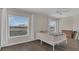 Bright bedroom featuring hardwood floors and large windows at 545 Fairhaven Dr, Davenport, FL 33837