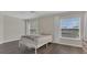 Bright bedroom featuring hardwood floors and large windows at 545 Fairhaven Dr, Davenport, FL 33837