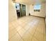 This bonus room features tile flooring and a window at 6337 Lido Ct, Orlando, FL 32807
