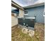 Exterior Goodman unit and window AC provide efficient climate control for the home at 6337 Lido Ct, Orlando, FL 32807