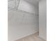 Walk-in closet with carpet floors and wire rack shelving for organized storage solutions at 64 Citrine Loop, Kissimmee, FL 34758