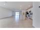 Spacious open-concept layout connecting the kitchen, dining, and living areas for modern living at 64 Citrine Loop, Kissimmee, FL 34758