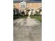 Inviting two-story townhome with a well-maintained lawn and driveway at 645 Captiva Cir, Kissimmee, FL 34741