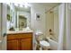 Bathroom featuring a shower-tub combination and vanity with decorative soap and towel at 8945 Cuban Palm Rd, Kissimmee, FL 34747