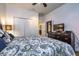 Comfortable bedroom features a large bed, dresser, and ample closet space at 8945 Cuban Palm Rd, Kissimmee, FL 34747