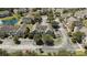 Expansive aerial view of the community, highlighting the lush landscaping and ample parking at 9061 Lee Vista Blvd # 1303, Orlando, FL 32829