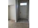Neutral entryway featuring tile flooring, a white front door, and clean, bright walls at 9061 Lee Vista Blvd # 1303, Orlando, FL 32829