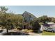 Attractive condominium featuring well-kept landscaping, a welcoming entrance, and convenient parking at 9061 Lee Vista Blvd # 1303, Orlando, FL 32829
