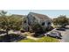 Attractive condominium featuring well-kept landscaping, a welcoming entrance, and convenient parking at 9061 Lee Vista Blvd # 1303, Orlando, FL 32829