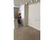 Neutral living room area near kitchen has carpet and ample lighting at 9061 Lee Vista Blvd # 1303, Orlando, FL 32829