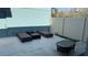 Enclosed backyard patio area with outdoor lounge furniture and a privacy fence at 10197 Ridgebloom Ave, Orlando, FL 32829