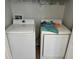 Laundry room featuring a side by side washer and dryer at 10197 Ridgebloom Ave, Orlando, FL 32829