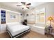 Multi-functional bedroom featuring a Murphy bed, built-in desk, shelving, and storage for a home office/guest room at 104 La Cresta Ct, Davenport, FL 33837