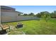This outdoor haven features a patio and firepit, perfect for gathering and outdoor enjoyment at 1246 Maplebrook Dr, Lake Alfred, FL 33850