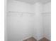 Walk-in closet featuring wire shelving, offering ample storage solutions at 1246 Maplebrook Dr, Lake Alfred, FL 33850
