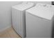 Convenient laundry area featuring a washer and dryer for easy laundry days at 1246 Maplebrook Dr, Lake Alfred, FL 33850