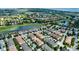 Scenic aerial view of a Primary-planned community surrounded by lakes and green spaces at 14049 Millington St, Orlando, FL 32832