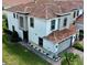 Aerial view of a two story home featuring a clay tile roof and a two car garage at 14049 Millington St, Orlando, FL 32832