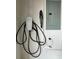 Tesla charger and vacuum in garage at 14049 Millington St, Orlando, FL 32832