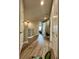 Hallway with hardwood floors and neutral walls at 14049 Millington St, Orlando, FL 32832