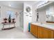 Bright bathroom featuring a walk-in shower, vanity with storage, and decor at 147 Pompei Dr, Kissimmee, FL 34758