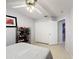 Neutral bedroom with tile floors, closet, and organized shoe rack at 147 Pompei Dr, Kissimmee, FL 34758